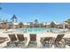 Community pool area with lounge chairs and covered seating, perfect for relaxation at 3656 Spindrift Dr, Mount Pleasant, SC 29466