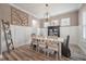 Elegant dining room features modern lighting, neutral tones, and stylish wainscoting at 3656 Spindrift Dr, Mount Pleasant, SC 29466
