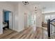 Hallway with hardwood floors and bright spaces to the bedrooms, laundry and sitting room at 3656 Spindrift Dr, Mount Pleasant, SC 29466
