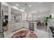 Bright kitchen with stainless appliances and views of a dining area at 3656 Spindrift Dr, Mount Pleasant, SC 29466