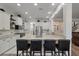 Bright kitchen features a large island with seating, white cabinetry, and stainless steel appliances at 3656 Spindrift Dr, Mount Pleasant, SC 29466