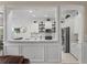 Bright kitchen with an island bar overlooking the living room at 3656 Spindrift Dr, Mount Pleasant, SC 29466