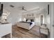 Bright main bedroom features modern decor, comfortable king bed, and ample natural light at 3656 Spindrift Dr, Mount Pleasant, SC 29466