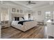 Spacious main bedroom showcasing natural light, stylish decor, and comfortable king bed at 3656 Spindrift Dr, Mount Pleasant, SC 29466