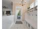 Bright mudroom showcasing stylish storage, natural light, and convenient access to outdoors at 3656 Spindrift Dr, Mount Pleasant, SC 29466