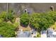 Aerial view of a home with a dock and a nicely landscaped yard at 3948 Gift Blvd, Johns Island, SC 29455