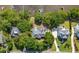 Aerial view of houses with landscaped yards, offering tranquil privacy in a lush, green waterfront community at 3948 Gift Blvd, Johns Island, SC 29455