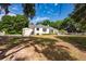 Well-maintained backyard with storage shed, lush greenery, and ample space for outdoor activities at 3948 Gift Blvd, Johns Island, SC 29455