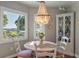 Lovely dining area with a chandelier fixture offering beautiful water views at 3948 Gift Blvd, Johns Island, SC 29455