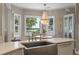 Charming dining area with a chandelier and water view at 3948 Gift Blvd, Johns Island, SC 29455