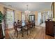 Well-lit dining room featuring hardwood floors, a chandelier, and plenty of space for entertaining at 3948 Gift Blvd, Johns Island, SC 29455