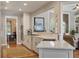 Modern kitchen showcasing countertops and stainless steel appliances, leading to living spaces at 3948 Gift Blvd, Johns Island, SC 29455