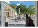 Expansive outdoor patio offering ample seating, barbecue area, perfect for entertaining with scenic surroundings at 3948 Gift Blvd, Johns Island, SC 29455