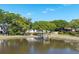 Beautiful waterfront property with private dock, lush trees, and serene water views at 3948 Gift Blvd, Johns Island, SC 29455