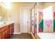 Bathroom vanity with double sinks, and a shower with stylish decorative glass at 4021 Sanderson Ln, Summerville, SC 29483