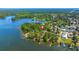 Aerial view showcasing property location with waterfront access, surrounded by trees at 423 Lake Moultrie Dr, Bonneau, SC 29431