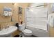 Bathroom with a shower, toilet and sink with light neutral walls and decor at 423 Lake Moultrie Dr, Bonneau, SC 29431