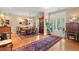 Inviting dining room with hardwood floors, elegant furnishings, and natural light at 423 Lake Moultrie Dr, Bonneau, SC 29431