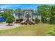 Beautiful home with a lush front yard, inviting entrance, and ample parking at 423 Lake Moultrie Dr, Bonneau, SC 29431