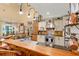 Spacious kitchen with stainless steel appliances, cabinetry, and bar seating at 423 Lake Moultrie Dr, Bonneau, SC 29431