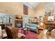 Bright living room with fireplace and access to the kitchen at 423 Lake Moultrie Dr, Bonneau, SC 29431