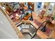 Open-concept living space with kitchen, multiple seating areas, and hardwood floors creating a welcoming ambiance at 423 Lake Moultrie Dr, Bonneau, SC 29431