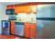 Well-equipped kitchen with stainless steel appliances and wooden cabinetry at 4233 Mariners Watch, Johns Island, SC 29455