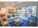Bright living room with sliding glass doors, comfortable seating, and stylish decor at 4233 Mariners Watch, Johns Island, SC 29455