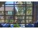 Cozy screened porch with comfortable seating and views of surrounding nature at 4233 Mariners Watch, Johns Island, SC 29455