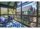 Inviting screened porch with comfortable seating and views of lush greenery at 4233 Mariners Watch, Johns Island, SC 29455