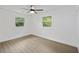 Bright bedroom featuring natural light from two windows and wood-look flooring at 4765 S Constellation Dr, North Charleston, SC 29418