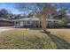 Charming brick home with an attached carport nestled on a picturesque lot at 4765 S Constellation Dr, North Charleston, SC 29418