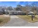 Charming brick home with an attached carport, classic mailbox, and lovely landscaping at 4765 S Constellation Dr, North Charleston, SC 29418