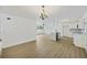 Open floor plan showcasing kitchen, dining and living area with modern fixtures and finishes at 4765 S Constellation Dr, North Charleston, SC 29418
