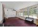 A sunroom with exposed brick and lots of natural light at 4765 S Constellation Dr, North Charleston, SC 29418