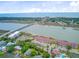 Community aerial view features waterways, nearby ocean access, a swimming pool, and lush landscaping, for premier resort lifestyle at 5 Mariners Cay Dr, Folly Beach, SC 29439