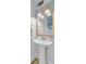 Charming powder room with pedestal sink, modern fixtures, and stylish decor at 5 Mariners Cay Dr, Folly Beach, SC 29439