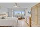 Bright bedroom boasts natural light, ceiling fan, and stylish furnishings at 5 Mariners Cay Dr, Folly Beach, SC 29439