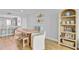 Bright dining room with wooden table, bench seating, and stylish décor for a comfortable and inviting space at 5 Mariners Cay Dr, Folly Beach, SC 29439