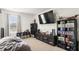 Media room featuring a large TV, comfy seating, and ample shelving for storage and display, perfect for entertainment at 514 Shady Maple St, Moncks Corner, SC 29461