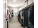 Spacious walk-in closet with custom shelving, ample hanging space, and organized storage for clothing and accessories at 514 Shady Maple St, Moncks Corner, SC 29461