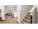 Interior view of open-concept living area, staircase and modern finishes at 514 Shady Maple St, Moncks Corner, SC 29461