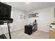 Home office space featuring a desk, modern lighting, and neutral carpeting at 514 Shady Maple St, Moncks Corner, SC 29461