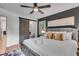 Inviting bedroom featuring a dark accent wall and a sliding barn door to the bathroom at 5155 Monterey St, North Charleston, SC 29405