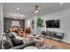 Spacious living room with modern furniture, stylish decor, and ample natural light at 5155 Monterey St, North Charleston, SC 29405