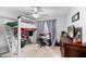 Bedroom featuring a loft bed, neutral carpet, and desk with natural light from the window at 5332 Copley Cir, Summerville, SC 29485