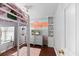 Bright room with a loft bed, plush rug, and decorative shelving for stylish storage at 5332 Copley Cir, Summerville, SC 29485