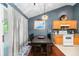 Combined dining and kitchen area with hardwood floors at 5332 Copley Cir, Summerville, SC 29485