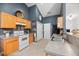 Functional kitchen featuring light wood cabinets and grey countertops at 5332 Copley Cir, Summerville, SC 29485