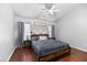 Spacious main bedroom with a vaulted ceiling, fan, and neutral decor with wood accents at 5332 Copley Cir, Summerville, SC 29485